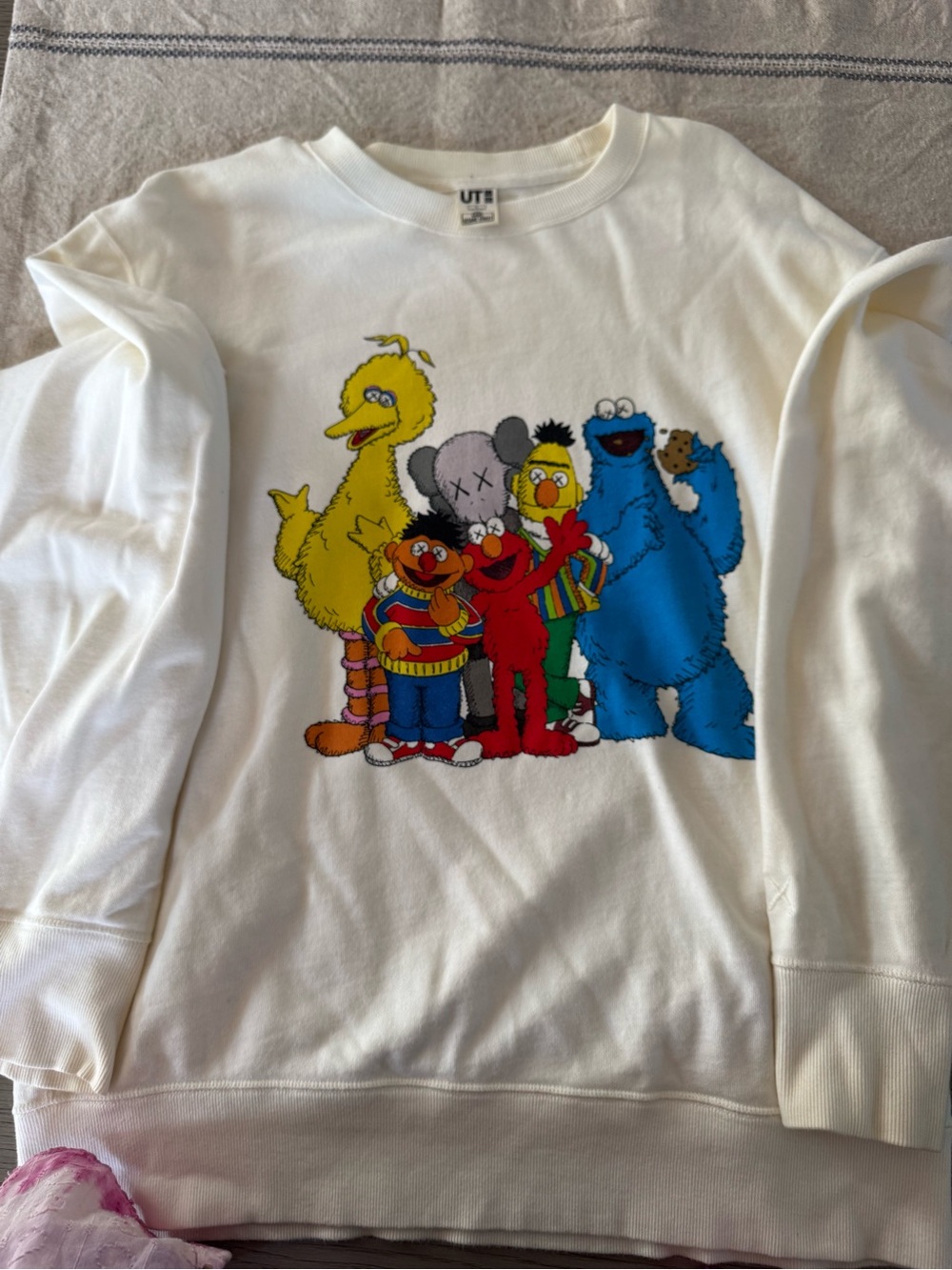 KAWS Sesame Street Crewneck Sweatshirt - White with Multicolor Character Graphic